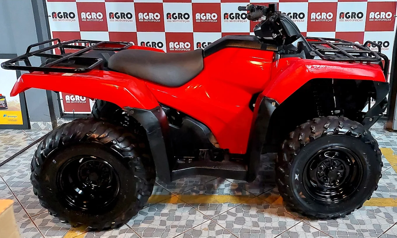 Quadriciclo Honda vermelho na loja Agro Motopeças